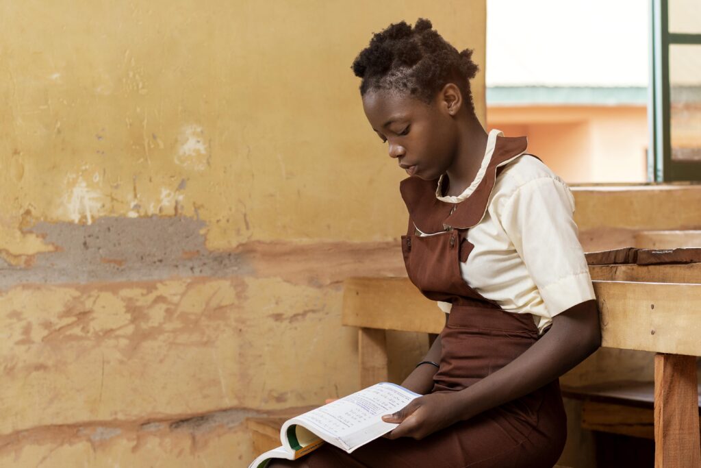 School girl reading